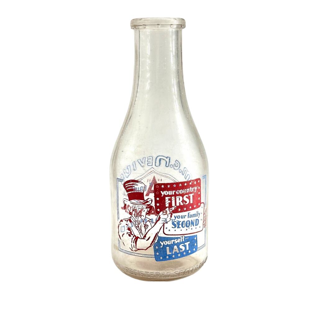 1951 M.G. Nevius Galveston TX Uncle Sam Duraglas Quart Milk Bottle ACL Pyro